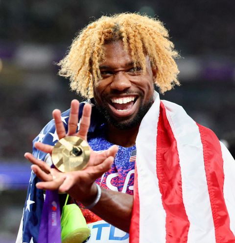 Noah Lyles celebrating 200m world title