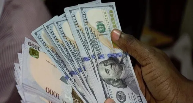 Naira gains N20.11 against dollar. at official window