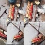 Nigerian Lady Shares Strange Discovery of Carved Wooden Effigy Washed Up by Floodwaters (VID)