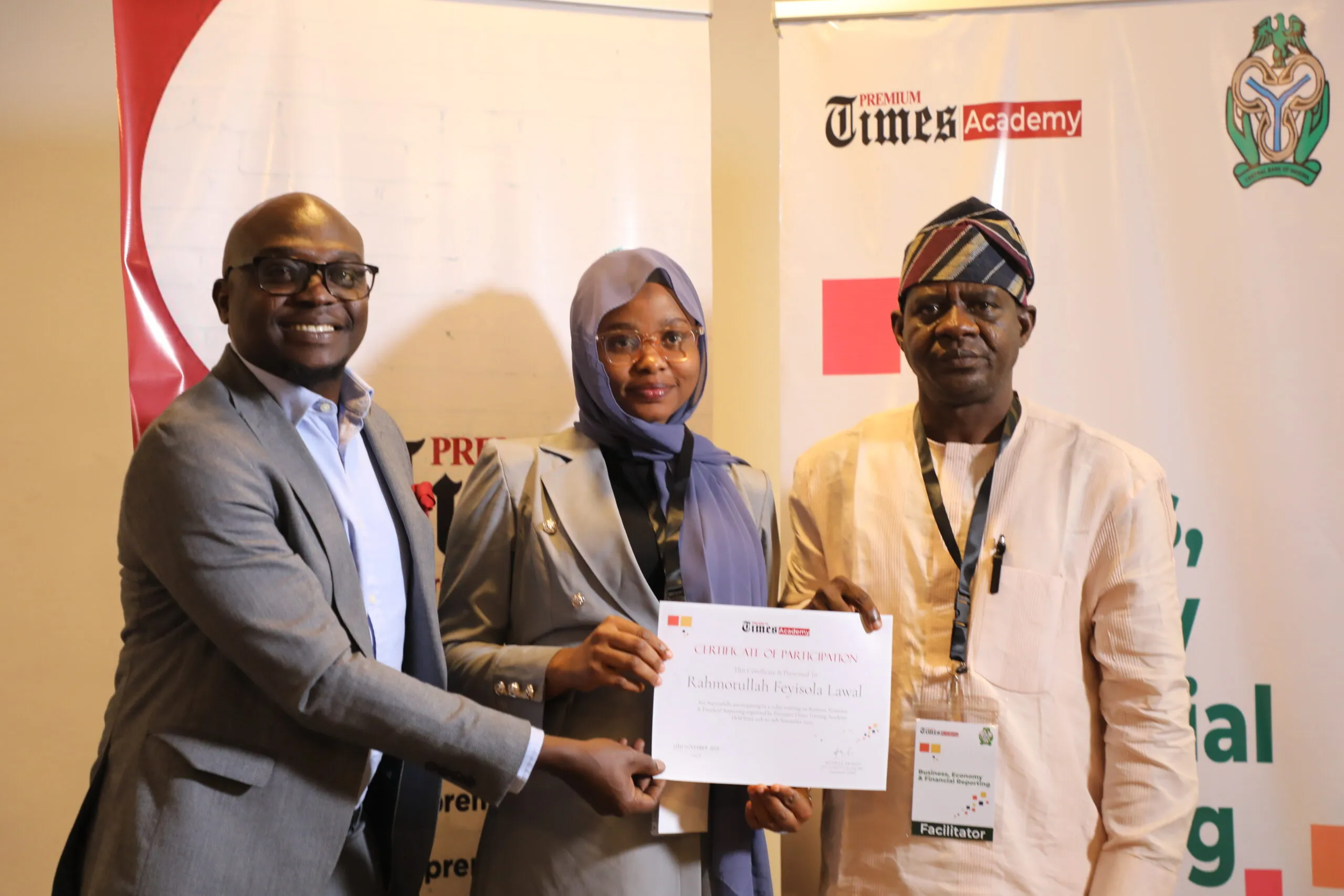 Participant being awarded certificate at the training  [PHOTO CREDIT: PREMIUM TIMES]